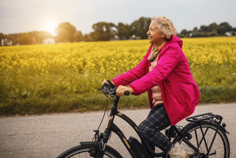 Mature woman riding on Electric Bike